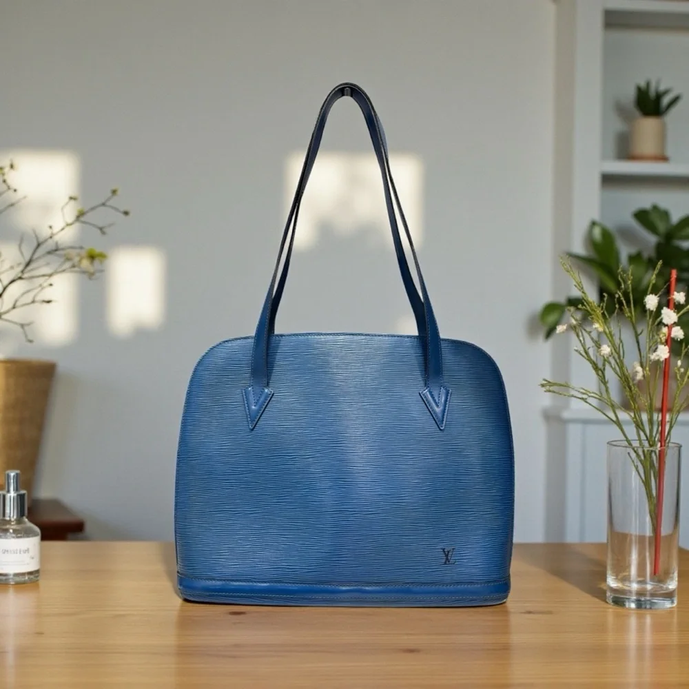 Louis Vuitton Epi Lussac MM β Toledo Blue - Picture 1 of 15